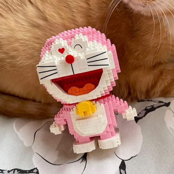 LP 200562 Anime Pink Doraemon Cat Stand Animal Robot 3D Model DIY Mini Diamond Blocks Bricks 1 - LOZ™ MINI BLOCKS